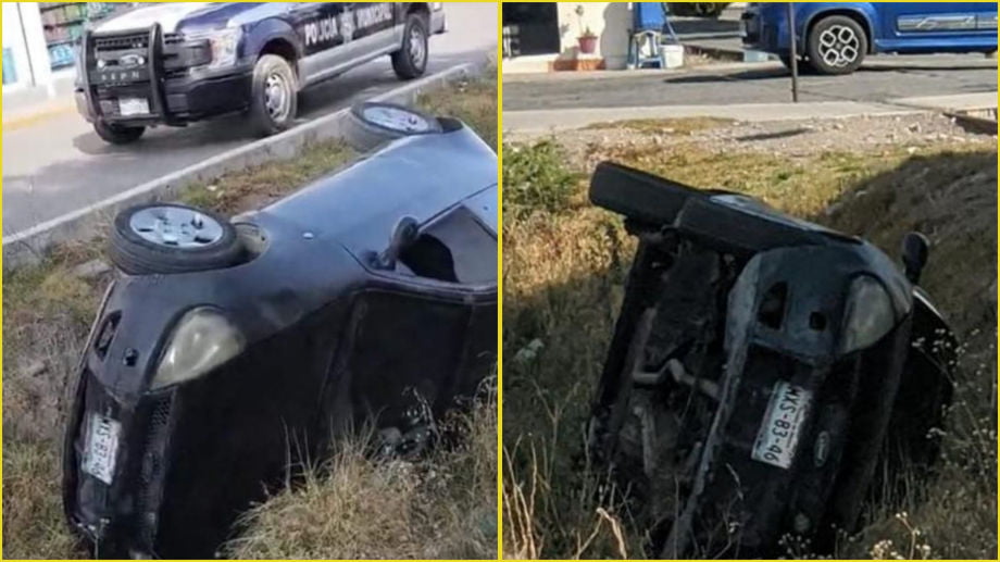 Auto compacto cae en canal de aguas negras en colonia de Pachuca