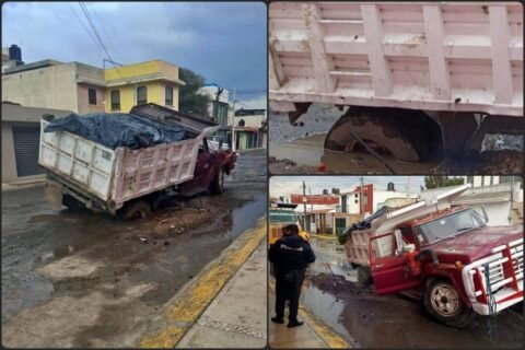 Camión de volteo se hunde en socavón formado en calle de Mineral de la Reforma